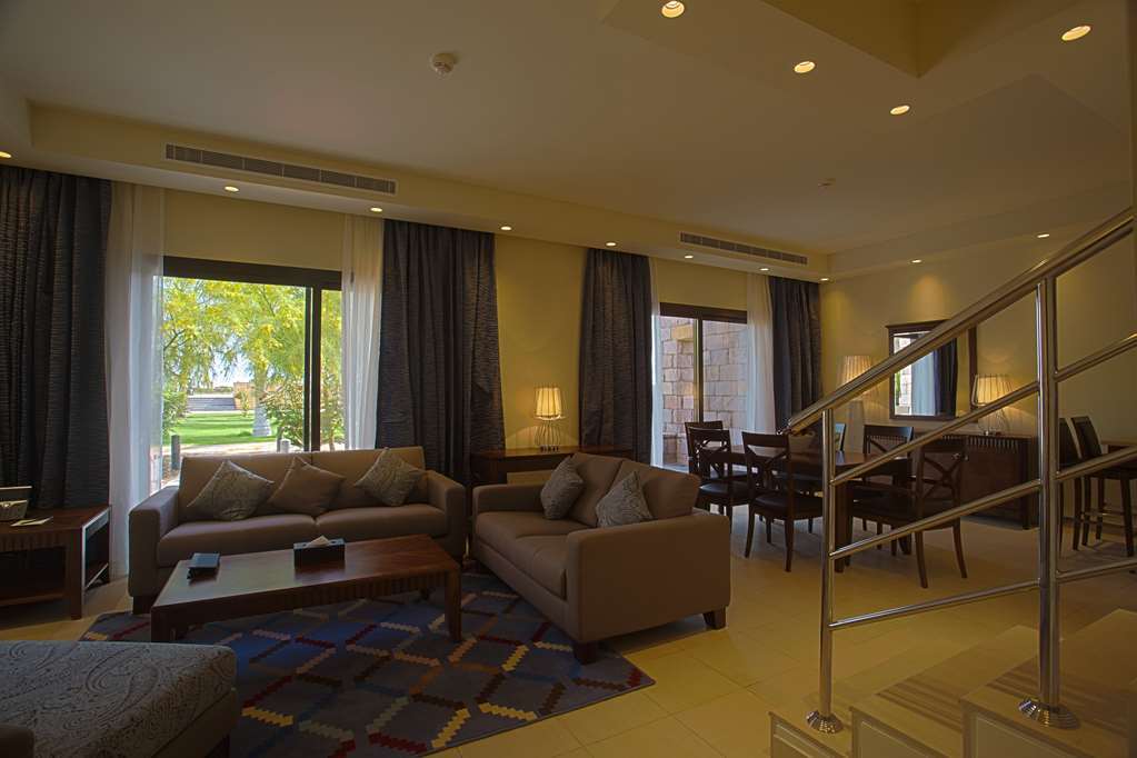 Golden Tulip Sharma Resort Chambre photo