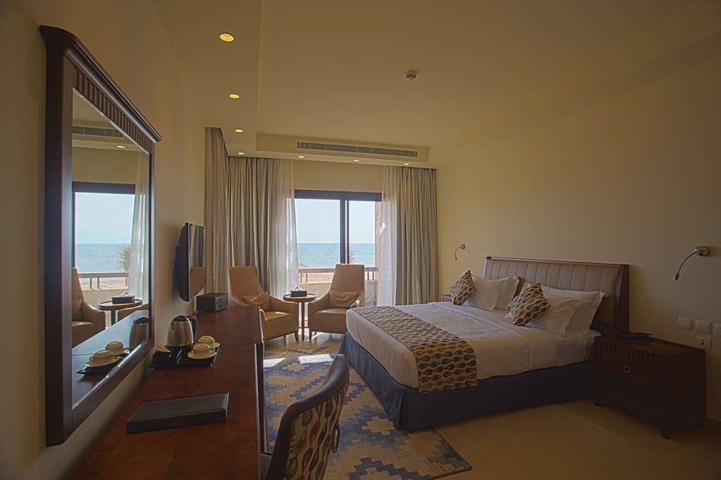 Golden Tulip Sharma Resort Chambre photo