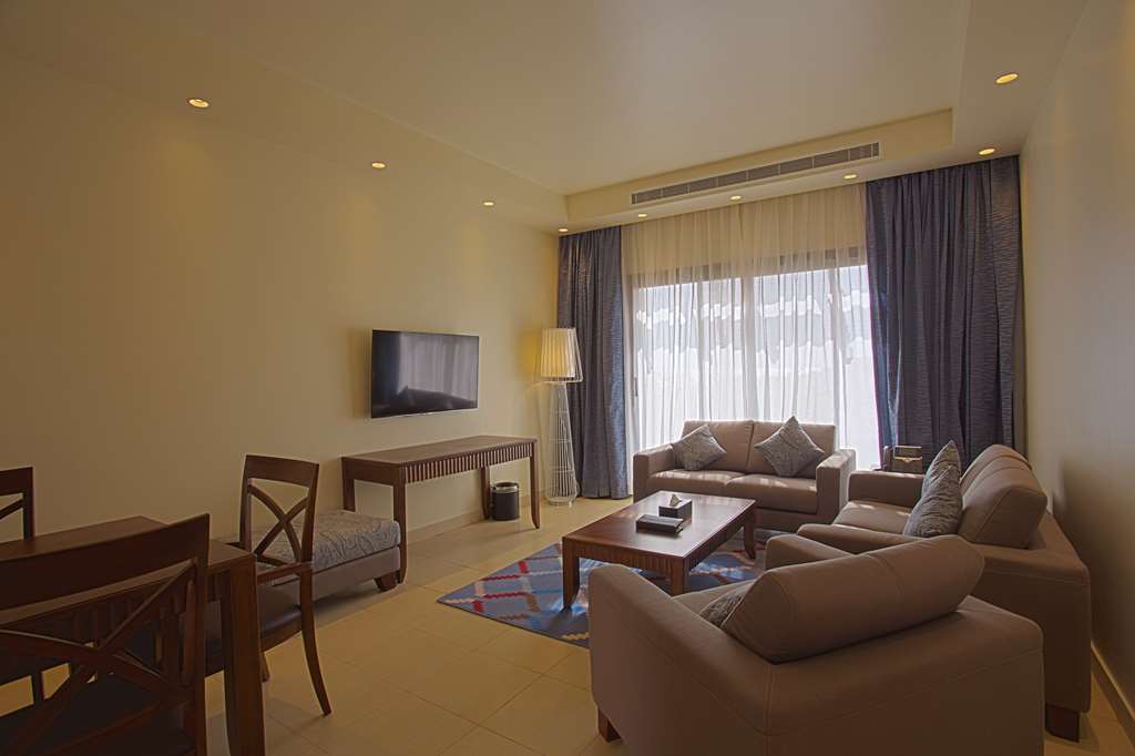 Golden Tulip Sharma Resort Chambre photo