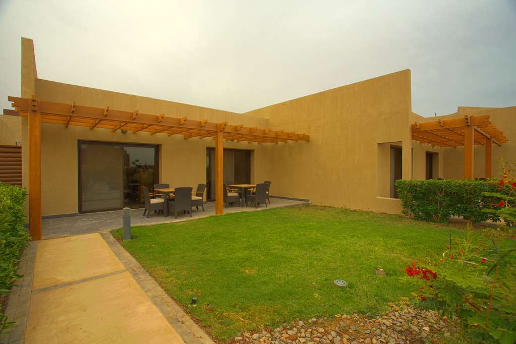 Golden Tulip Sharma Resort Chambre photo